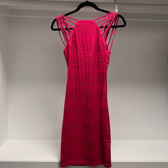 Brand is Mystic from LA. Lower cut back with straps to add accent in the back - Picture 1 of 2